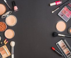 high-angle-view-various-makeup-products-black-background_23-2147899430
